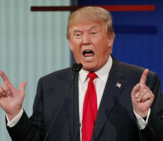 Trump Targets Media and Democrats Over Coverage of Iran US President Donald J Trump wrapped in Blue suit with red tie, shouting on media persons