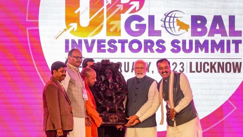 Stage banner of UP Global Investors Summit at Lucknow, PM Modi CM Yogi and Deputy CM Brijesh Pathak in the frame