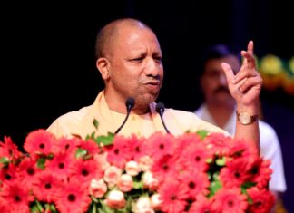 UP CM Yogi Adityanath addresses public gathering from dias.
