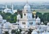 White building with round dom on the top is seen of KGMU Lucknow campus