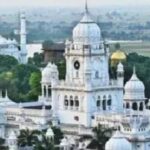 White building with round dom on the top is seen of KGMU Lucknow campus