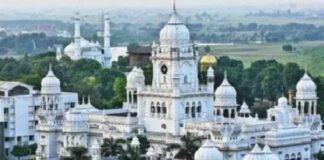 White building with round dom on the top is seen of KGMU Lucknow campus