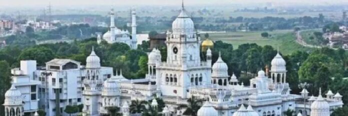 White building with round dom on the top is seen of KGMU Lucknow campus